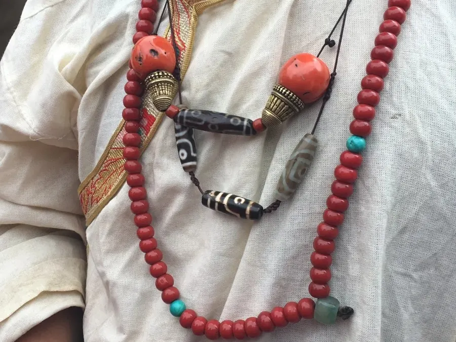 Patterned Dzi beads used in Tibetan-inspired jewelry