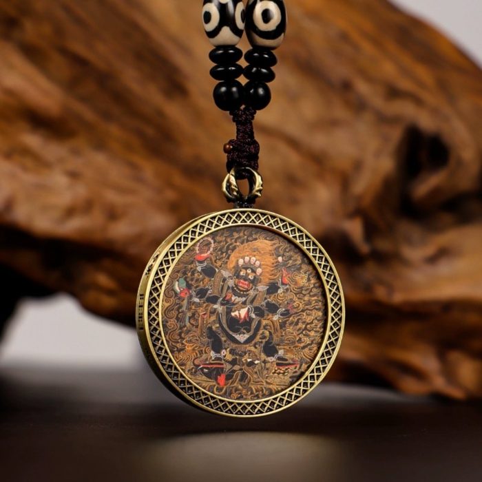 Tibetan Buddhist circular thangka necklace in a copper gawu box